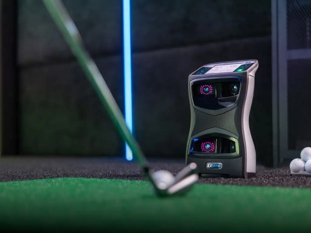 Golf simulator installation with impact screen projector and smart lighting